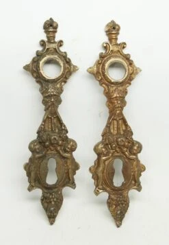 Pair Of Highly Ornate Cherubic Figural 9.375 In. Back Plates