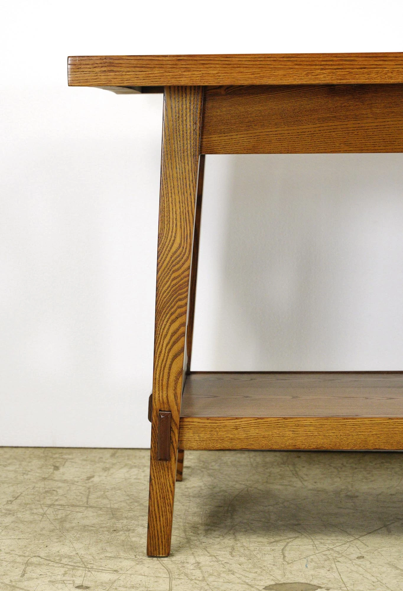 Vintage 58 In. Spade Carvings Medium Tone Oak Table With Shelf 4 Vintage 58 In. Spade Carvings Medium Tone Oak Table With Shelf - Image 2