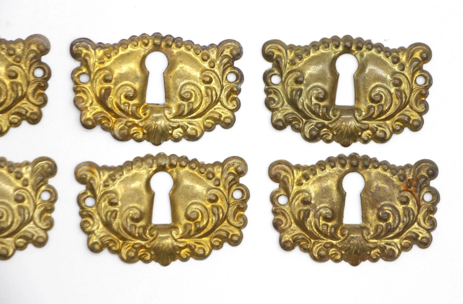 Set Of 10 Vintage Ornate Pressed Brass Keyhole Covers 5 Set Of 10 Vintage Ornate Pressed Brass Keyhole Covers - Image 3