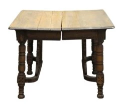 Table With Decorative Base Carvings