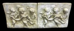 Set Of Two Cast Cherub Reliefs In Composite