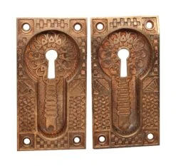 Pair Of Aesthetic Bronze Keyhole Pocket Door Plates