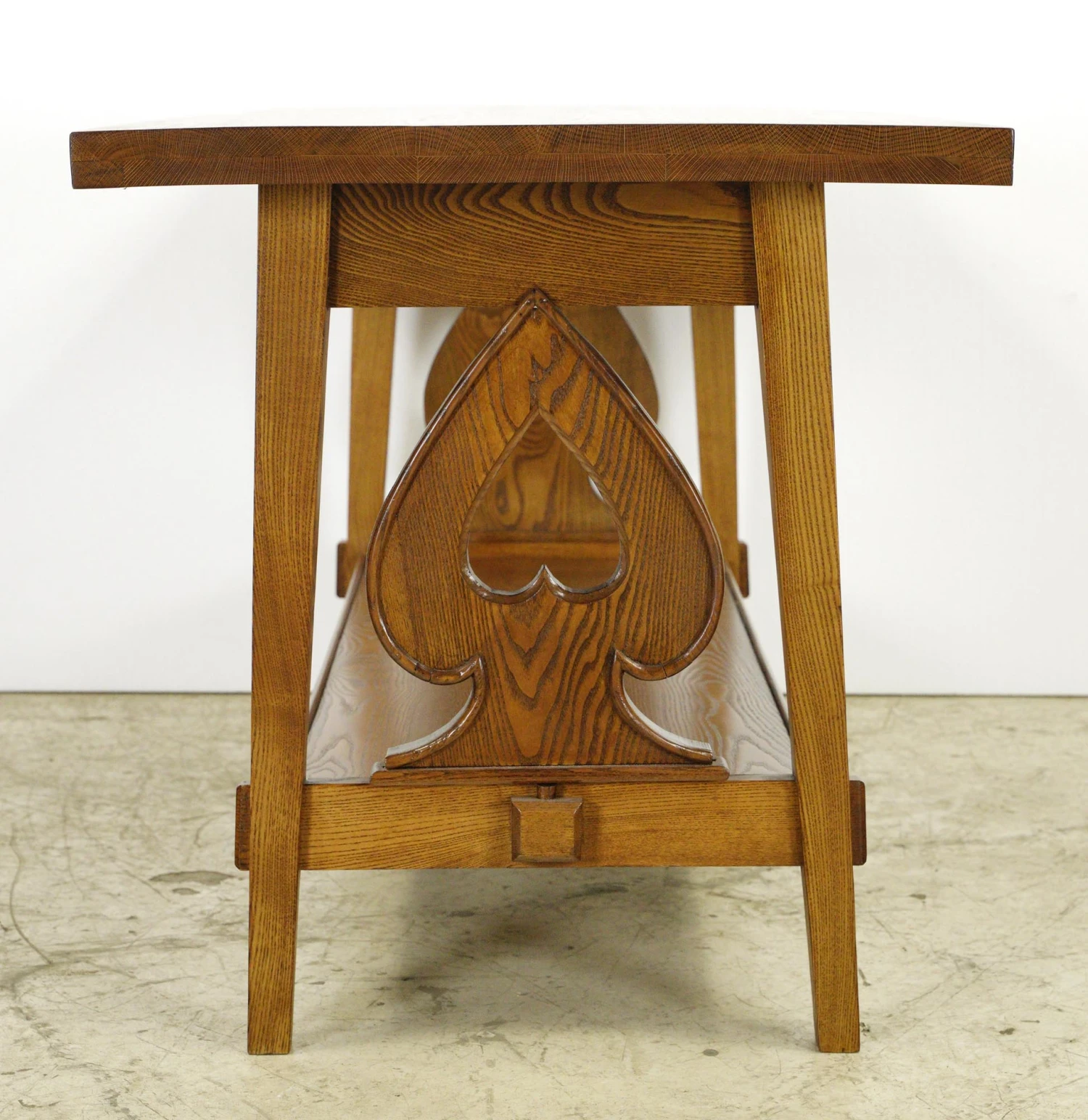 Vintage 58 In. Spade Carvings Medium Tone Oak Table With Shelf 13 Vintage 58 In. Spade Carvings Medium Tone Oak Table With Shelf - Image 11