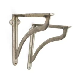 Pair Of Waldorf Astoria Nickeled Brass Shelf Brackets